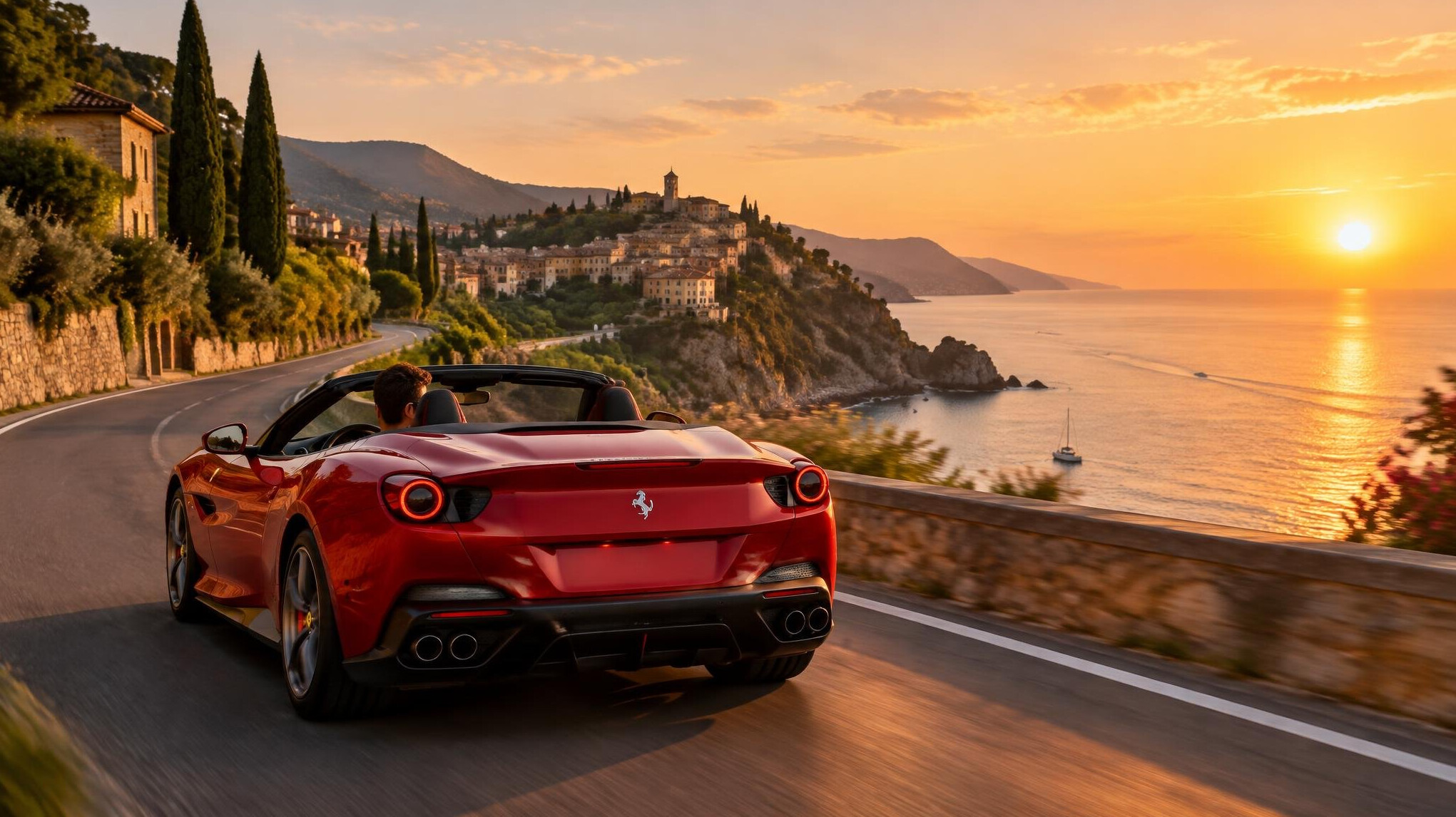 red sports car on coastal road